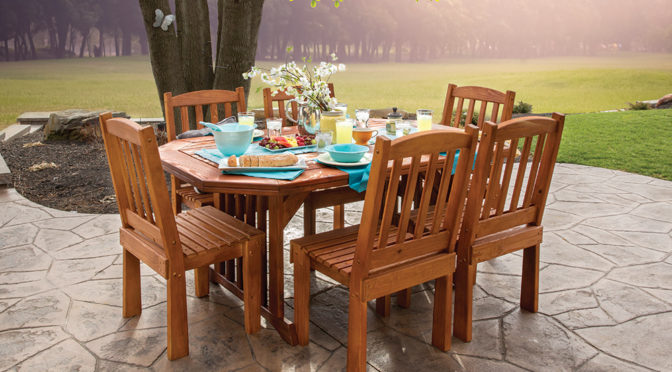 Patiova wooden English Garden table with six side chairs in canyon brown stain.